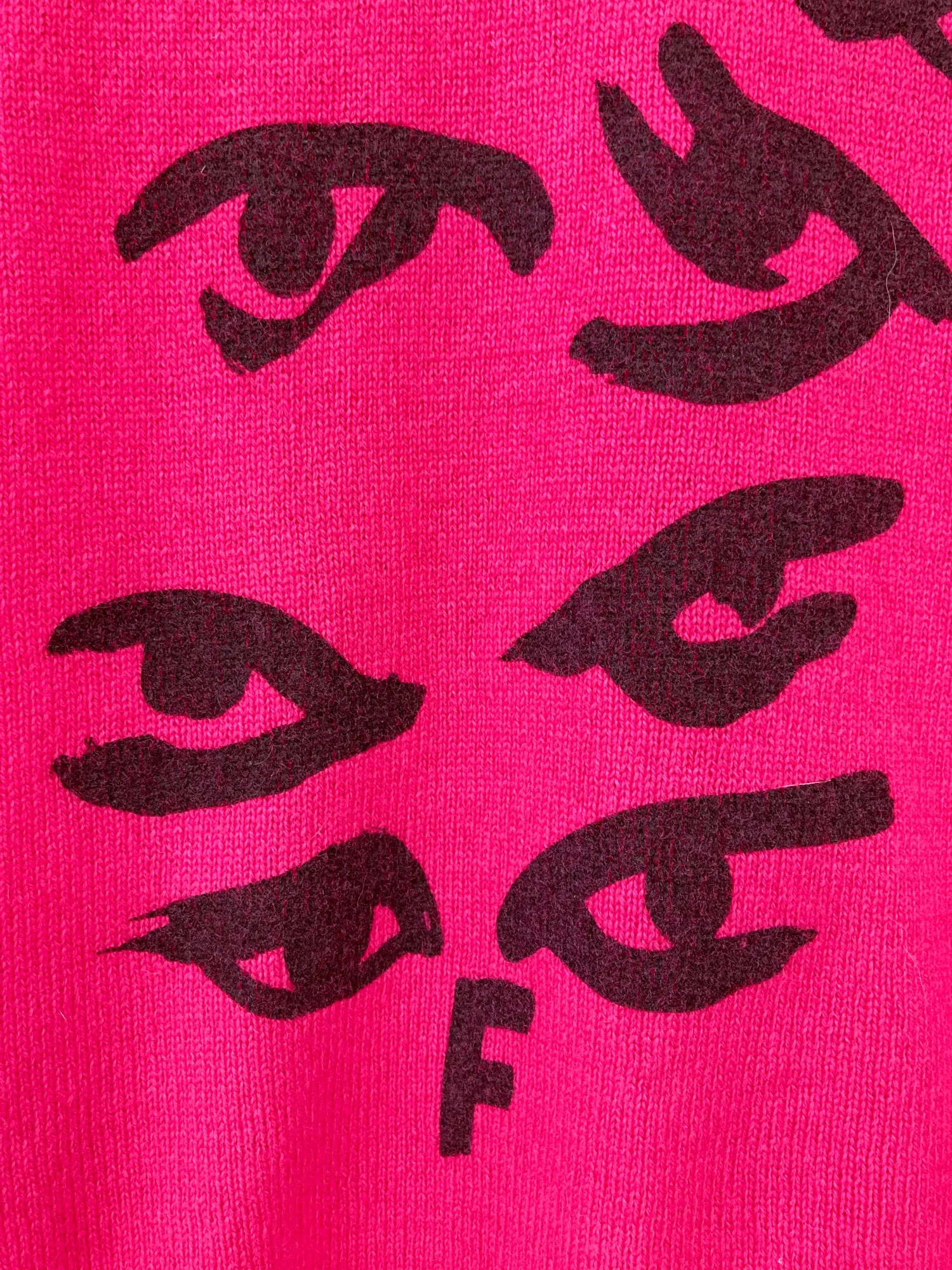 Comme des Garcons AW2000 pink wool knit sweater with eyes on front