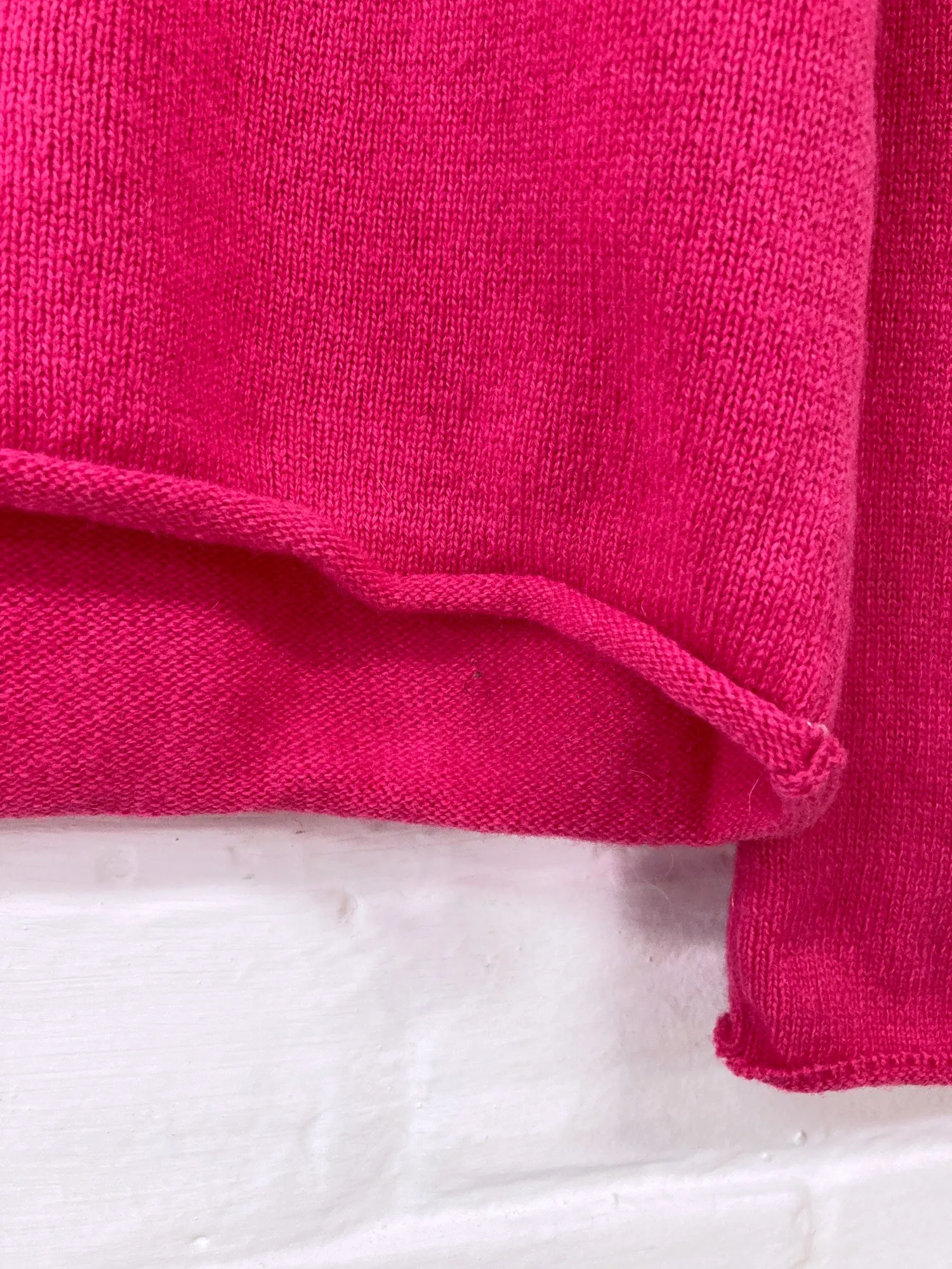 Comme des Garcons AW2000 pink wool knit sweater with eyes on front